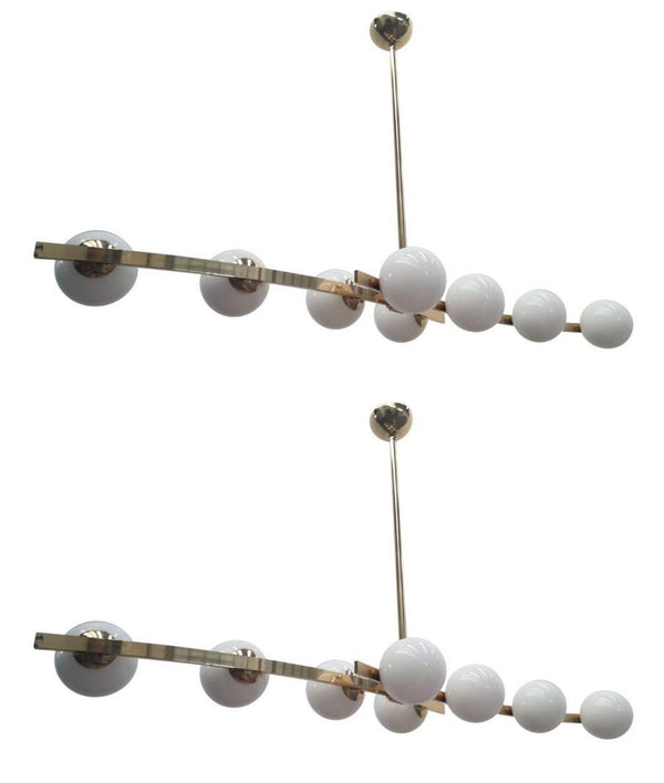 Pair of Cresta Chandeliers in the style of Arredoluce. Italy, 1970's.