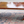 Load image into Gallery viewer, English Regency Mahogany & Satinwood Extendable Dining Table. 1960's.