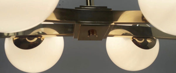 Pair of Cresta Chandeliers in the style of Arredoluce. Italy, 1970's.