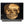 Load image into Gallery viewer, Pair of Early 21st C. Black Commodes with Inlaid Skull Design and Resin Finish