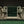 Load image into Gallery viewer, Late 19th C. English Eagle Bankers Table with Verde Marble & Glass Top