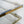Load image into Gallery viewer, Sleek Vintage Lucite & Brass Two-Tier Coffee Table by Charles Hollis Jones, c. 1960's