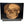 Load image into Gallery viewer, Pair of Early 21st C. Black Commodes with Inlaid Skull Design and Resin Finish