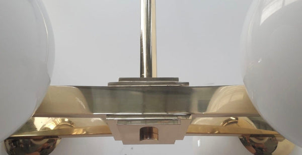 Pair of Cresta Chandeliers in the style of Arredoluce. Italy, 1970's.