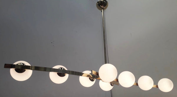 Pair of Cresta Chandeliers in the style of Arredoluce. Italy, 1970's.