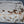 Load image into Gallery viewer, Lucite Bench with Gold Splatter Cowhide Upholstery, U.S.A. 1980's.