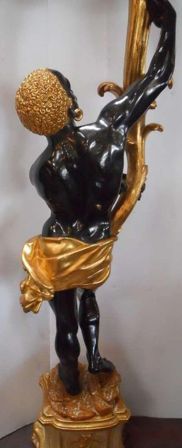 Early 20th Century Pair of Venetian Blackamoor Torcheres.