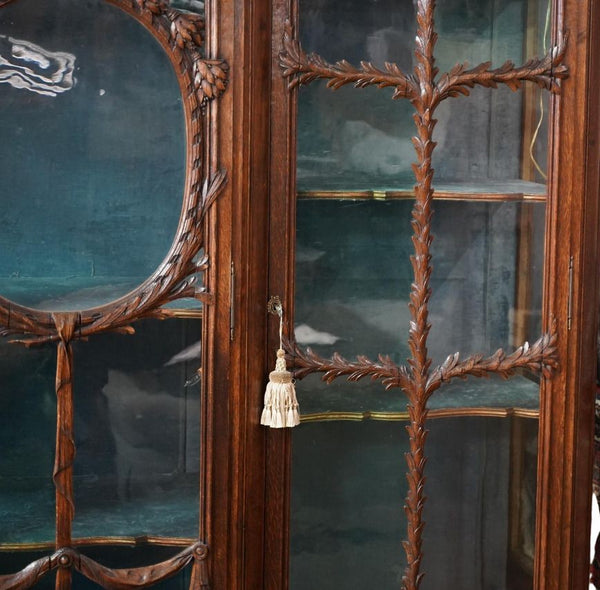 Late 19th Century French Oak Display Cabinet with Ribbon & Garland Glazing