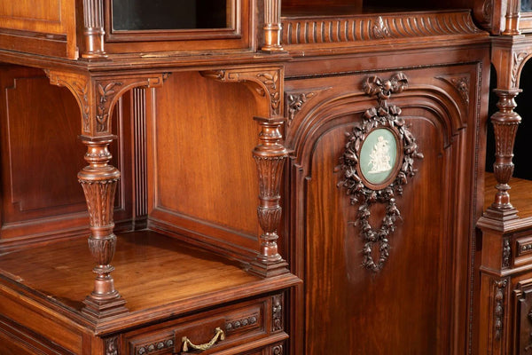 Late 19th Century Monumental French Carved Walnut Cabinet with Wedgwood Plaques