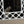 Load image into Gallery viewer, Italian Mirror w/ White Murano Glass in Venetian Crisscross Design, 1990s