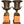Load image into Gallery viewer, Pair of 19th Century French Bronze Urns on Marble Pedestals.
