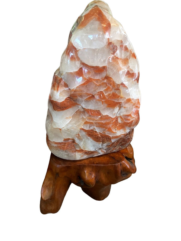 Large Red Calcite Stone on Wooden Base, Early 20th Century. Morocco.