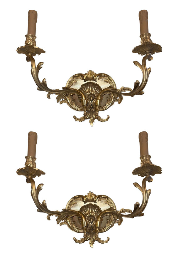 Pair of French Gilt Bronze Louis XV Style Two-Light Wall Sconces. 20th Century.