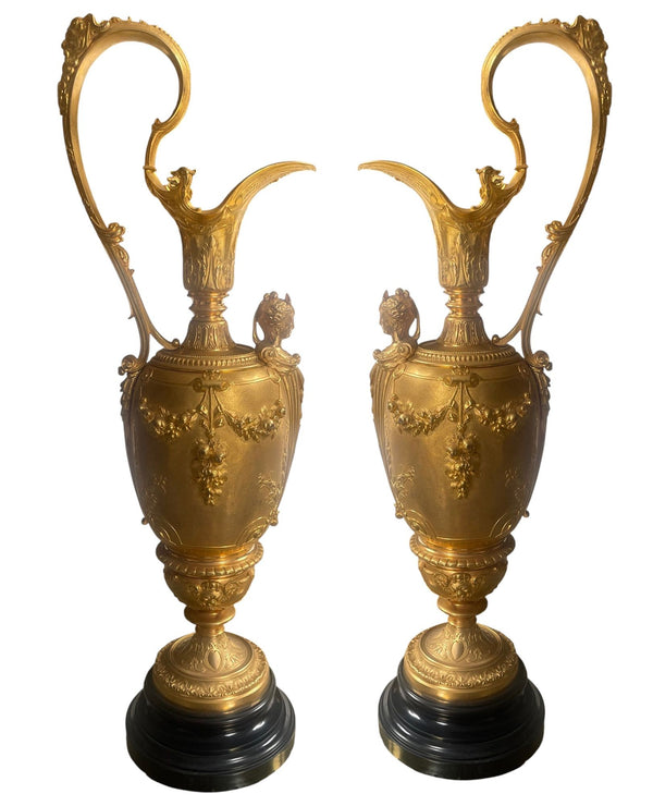 Pair of French Belle Époque Gilt Bronze Ewers on Marble Bases. Late 19th Century