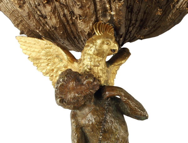 Pair of Figural Patinated & Gilt Bronze Garnitures with Shell-Form Bowl