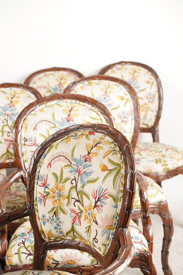 Set of Ten Hand-Carved Leaf Pattern Chairs with Floral Crewelwork. U.S.A. 1960's