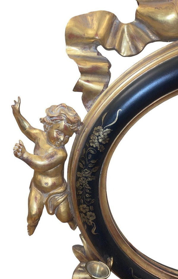 Italian 20th C. Rococo Style Ebonized & Giltwood Mirror w/ Putti & Candle Arms