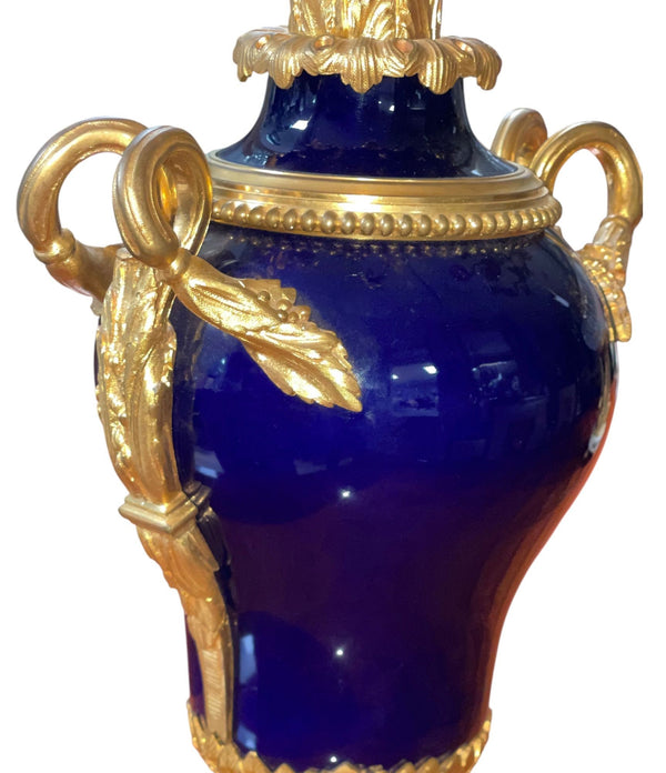 Pair of French Bronze & Deep Cobalt Porcelain Candelabras. 19th Century.