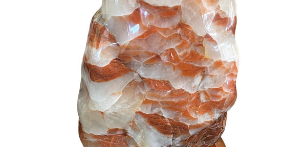 Large Red Calcite Stone on Wooden Base, Early 20th Century. Morocco.