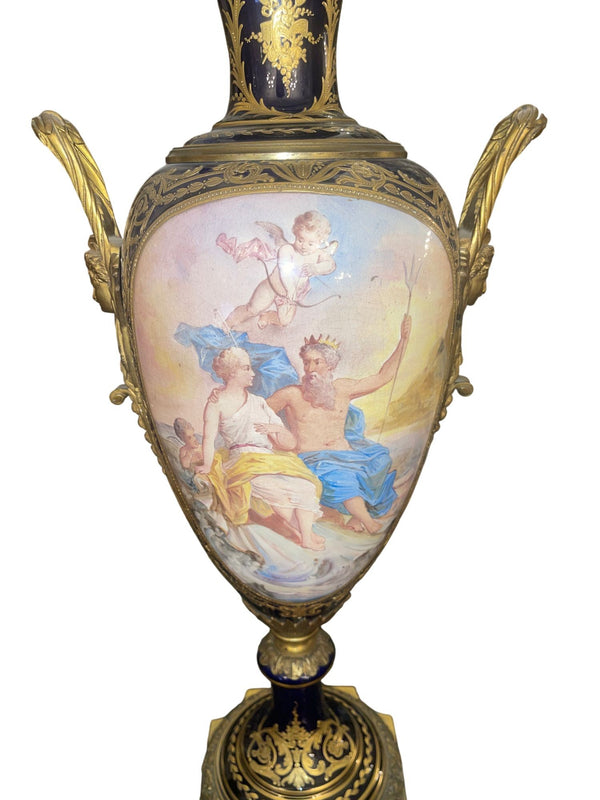 Pair of 19th Century French Sèvres Porcelain Urns with Ormolu Mounts