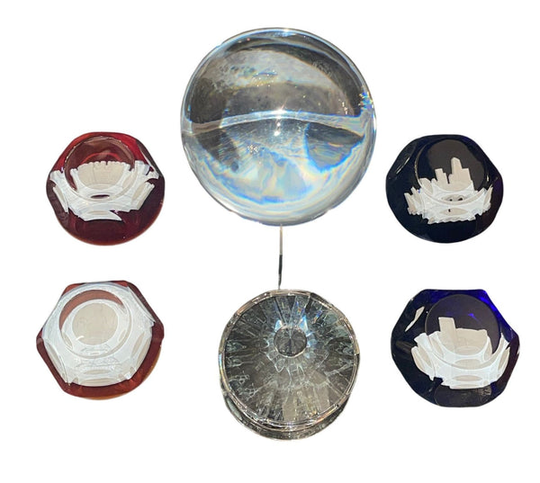 Seven Baccarat Pieces Including Crystal Paperweights and Sirius Crystal Sphere