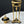 Load image into Gallery viewer, French Empire-Style Bronze Reversible Candlesticks
