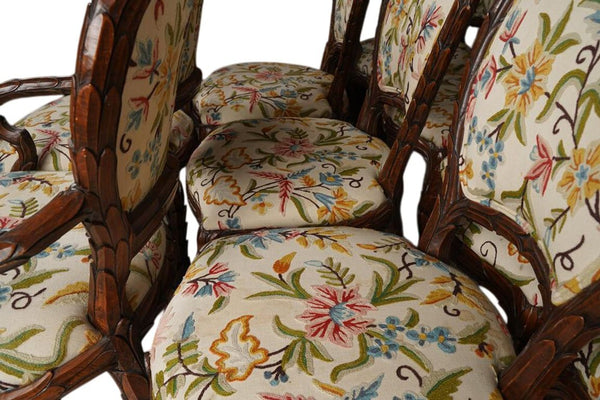 Set of Ten Hand-Carved Leaf Pattern Chairs with Floral Crewelwork. U.S.A. 1960's