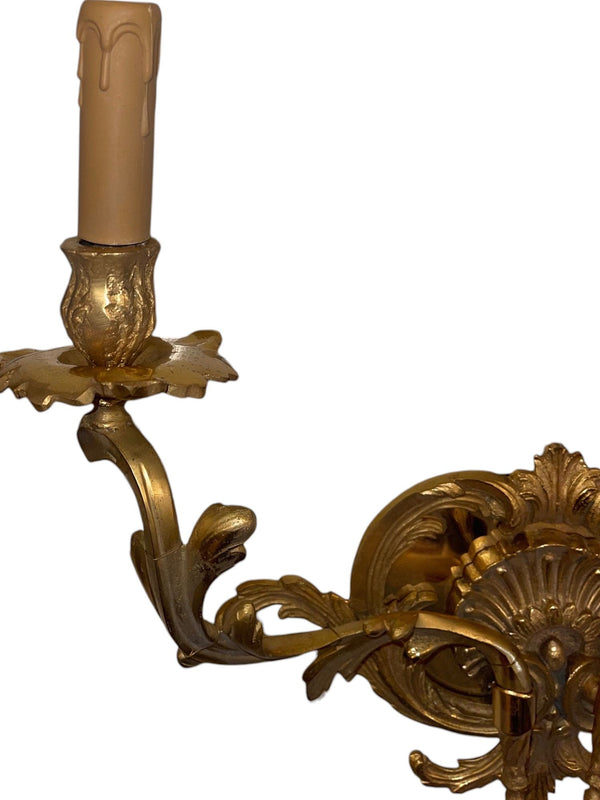 Pair of French Gilt Bronze Louis XV Style Two-Light Wall Sconces. 20th Century.
