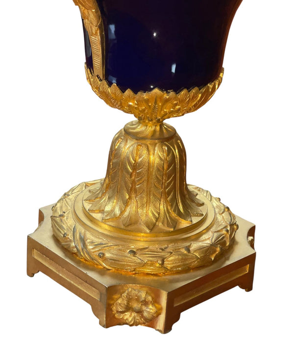 Pair of French Bronze & Deep Cobalt Porcelain Candelabras. 19th Century.