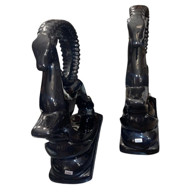 Pair of Royal Haeger Glossy Black Gazelle Sculptures. U.S.A. Late 20th Century.