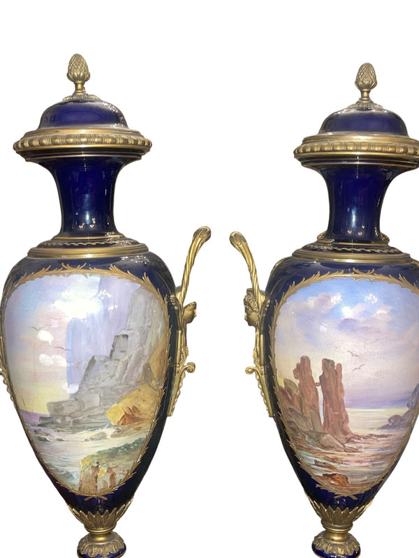 Pair of 19th Century French Sèvres Porcelain Urns with Ormolu Mounts