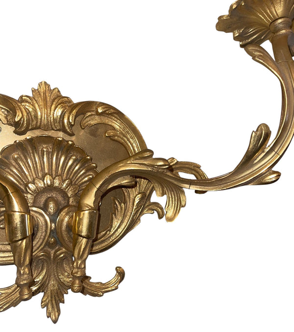 Pair of French Gilt Bronze Louis XV Style Two-Light Wall Sconces. 20th Century.