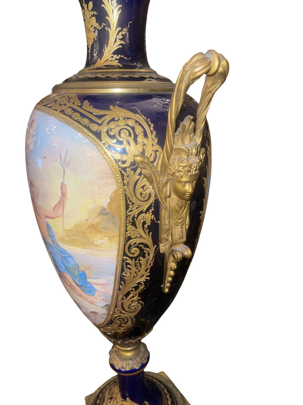 Pair of 19th Century French Sèvres Porcelain Urns with Ormolu Mounts