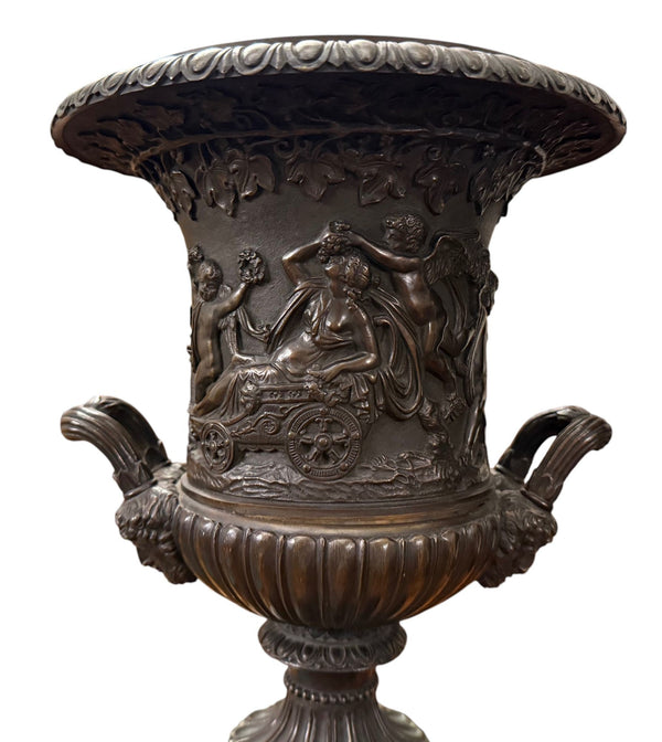 Pair of 19th Century French Bronze Urns on Marble Pedestals.