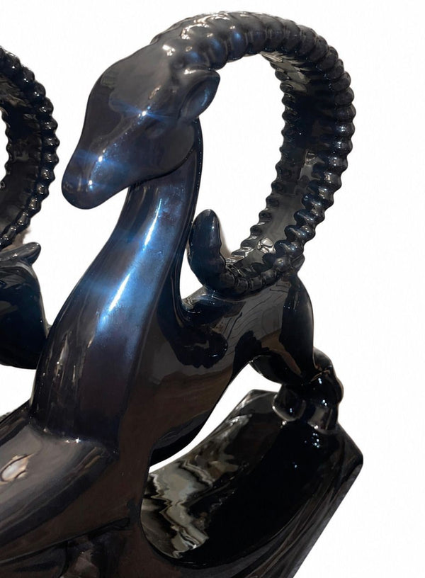 Pair of Royal Haeger Glossy Black Gazelle Sculptures. U.S.A. Late 20th Century.