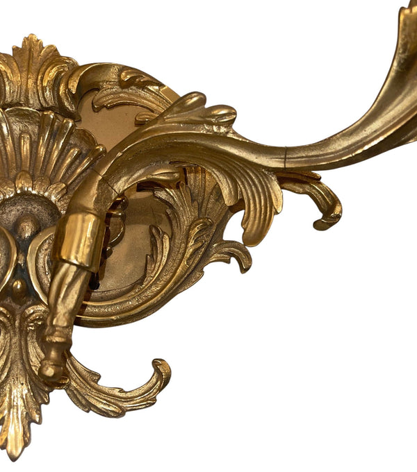 Pair of French Gilt Bronze Louis XV Style Two-Light Wall Sconces. 20th Century.