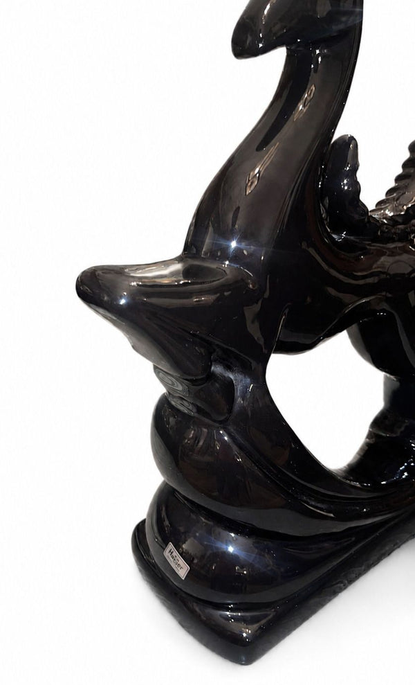 Pair of Royal Haeger Glossy Black Gazelle Sculptures. U.S.A. Late 20th Century.