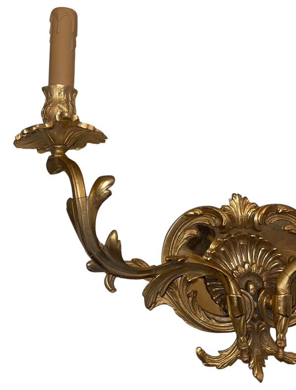 Pair of French Gilt Bronze Louis XV Style Two-Light Wall Sconces. 20th Century.