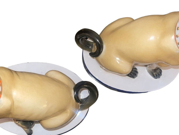 Pair of Mottahedeh Pug Dog Figures, Staffordshire Style, Mid-20th Century.