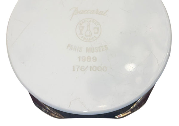 Seven Baccarat Pieces Including Crystal Paperweights and Sirius Crystal Sphere