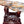 Load image into Gallery viewer, 100 Million Year Old Burmese Petrified Wood Sculpture on Carved Stand
