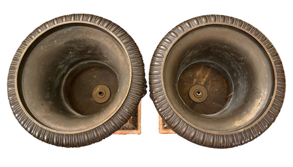 Pair of 19th Century French Bronze Urns on Marble Pedestals.
