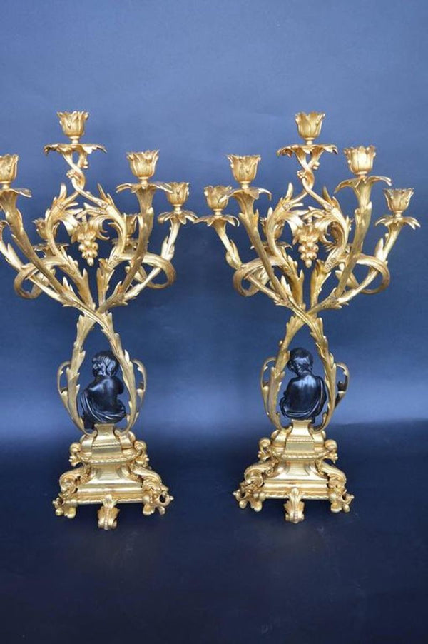 Pair of Bronze Putti Candelabras