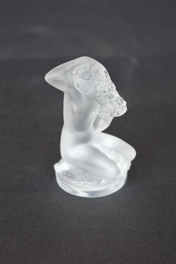 Collection of Figurines and a Pair of Candle Sticks by Lalique