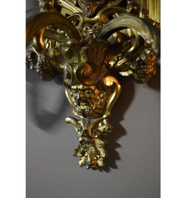 Pair of Detailed Bronze Sconces